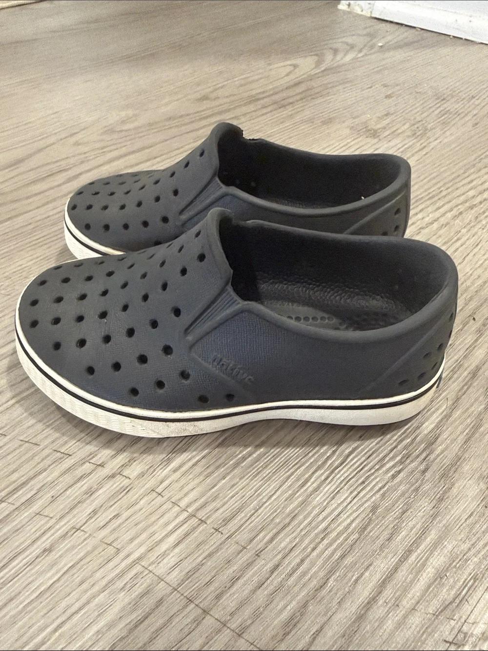 Native Black Perforated Slip-On Loafers with Off-White Trim Toddler C8